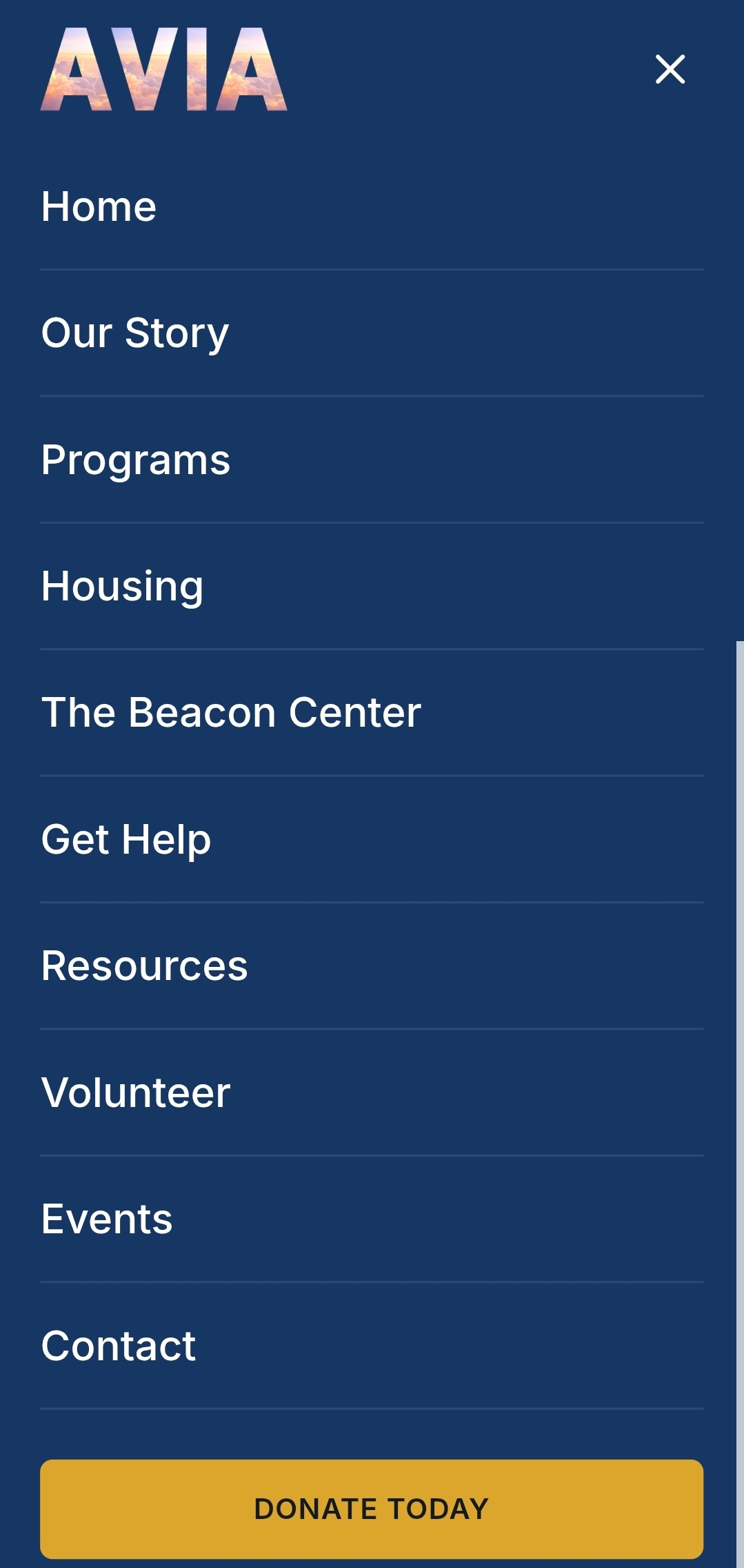 The public site's navigation menu listing home, our story, programs, housing, the community center, get help, resources, volunteer, events, and contact, with a donate today button